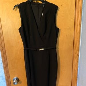 White House Black Market, Black knee length belted dress. Size 10. V neck